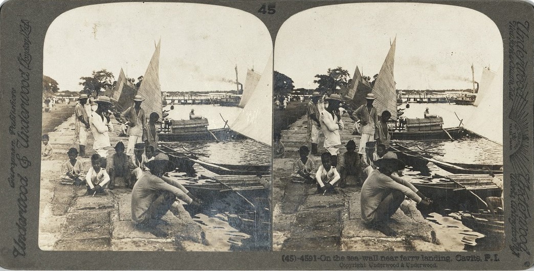 On the sea-wall near ferry landing, Cavite, P. I.